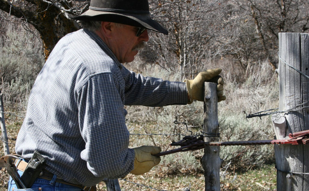 Fencing on the Diamondback W Ranch