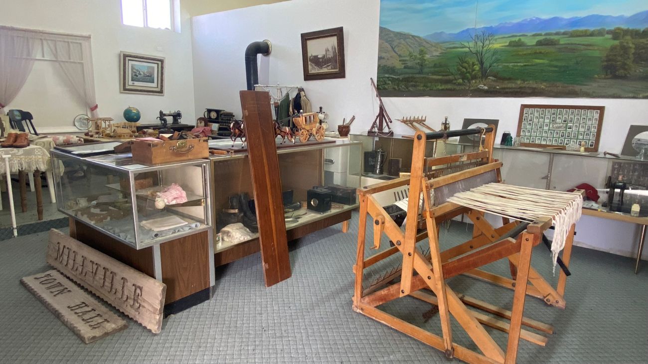 The inside of the Millville Museum featuring historic photos and artifacts donated by residents of Millville, Utah.